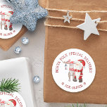 North Pole Special Delivery Cute Santa & Reindeer Classic Round Sticker<br><div class="desc">North Pole Special Delivery Christmas stickers for kids gifts,  personalized with your child's name. The wording is lettered in whimsical typography and is fully editable. This cute watercolor illustration has Santa Claus with his reindeer and a cardinal.</div>