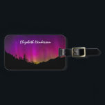Northern Lights Aurora Borealis Starry Night Sky Luggage Tag<br><div class="desc">A beautiful night time landscape. The mountains and trees appear as a black silhouette against a bright and vivid display of northern lights shimmering above. This exciting night sky glows in pink,  purple and yellow. Great for astronomy lovers.</div>