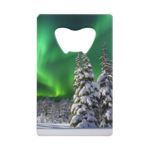 Northern lights during winter credit card bottle opener