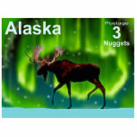 Northern Lights Moose - Alaska Postage Cutout<br><div class="desc">This is one of a series of postage stamps of a mythical independent Alaska. An ever so slightly stylized image of a moose silhouetted against the green and glowing Northern Lights.  Text reading "Alaska" and "Postage 3 Nuggets" also appears.</div>