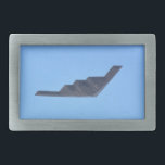 Northrop Grumman B-2 Spirit Belt Buckle<br><div class="desc">Northrop Grumman B-2 Spirit is an American heavy strategic bomber designed with low-observable stealth technology. It is a subsonic flying wing that was produced between 1987 and 2000. The bomber is flown by the United States Air Force and has a crew of two. The photo of the bomber was taken...</div>
