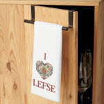 Norwegian Rosemaling I Love Lefse Kitchen Towel<br><div class="desc">This hat features a Norwegian Rosemaling style Folk Art Heart design that goes with the phrase I heart lefse (I love lefse). Colors include red,  blue,  green and golden yellow.</div>