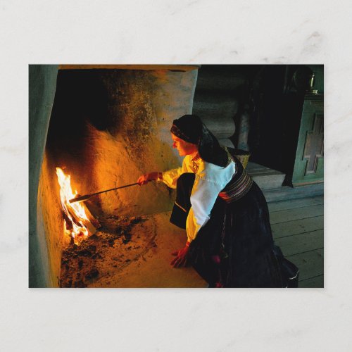 Norwegian Woman Tending the Hearth Fire Postcard