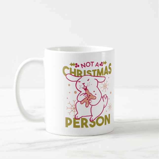Not a Christmas Person Rabbit Eating a Cookie Coffee Mug (Left)