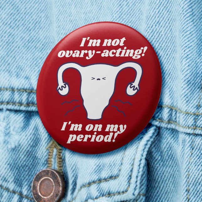 Not Ovary-Acting Red White Funny Period Slogan Button (Red badge with cartoon uterus and slogan 'I'm not ovary-acting, I'm on my period!')
