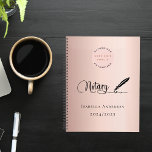 Notary loan signing agent rose gold 2024 planner<br><div class="desc">A chic rose gold,  blush background,  decorated with a feather pen.  Personalize and add your business logo and a name and year(s).  Black text: Notary</div>