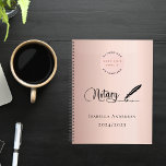 Notary loan signing agent rose gold 2025 planner<br><div class="desc">A chic rose gold,  blush background,  decorated with a feather pen.  Personalize and add your business logo and a name and year(s).  Black text: Notary</div>