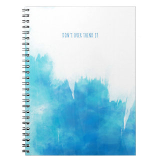 Notebook with "DON'T OVER THINK IT" statement.