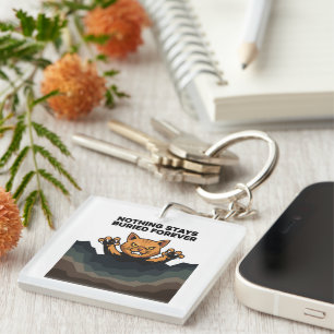 "NOTHING STAYS BURIED FOREVER" Orange Cat Keychain
