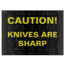 Novelty Caution. Knives are sharp. Cutting Board