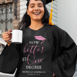 'Now Hotter By One Degree' Graduate T-Shirt<br><div class="desc">A trendy girly graduation T-shirt featuring the funny quote 'Now Hotter by One Degree' (the number of degrees can be cutsomized) and a pink motarboard cap. Simply personalize the template by adding name and class year.</div>