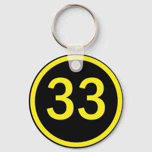 number 33 in a circle keychain