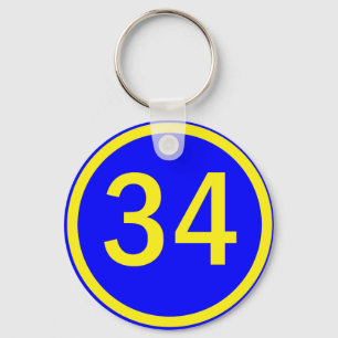 number 34 in a circle keychain