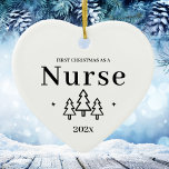 Nurse First Christmas Ornament 2024<br><div class="desc">First Christmas as a nurse heart ornament for a new job in nursing. Elegant porcelain ceramic holiday ornaments in white with black lettering. Featuring Christmas trees and stars.</div>