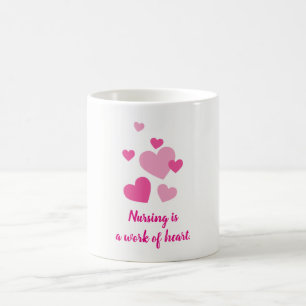 Nursing is a work of heart pink design coffee mug