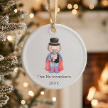 Nutcracker Drosselmeyer Christmas Photo Ceramic Ornament<br><div class="desc">Make your Christmas season unforgettable with this whimsical nutcracker Drosselmeyer themed photo ornament. The single photo slot on the back of the ornament allows you to showcase your family's sweet moments. It’s time for a sugar plum holiday celebration! You can personalize this design by clicking on "Personalize this template" or...</div>