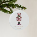 Nutcracker pink white simple Christmas Glass Ornament<br><div class="desc">White background,  and a pink nutcracker.  Personalize and add a name and year.</div>