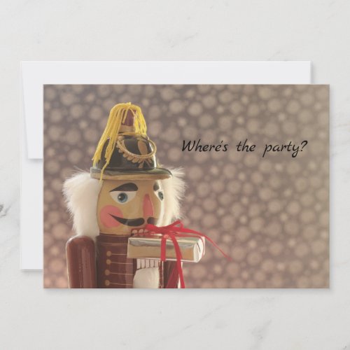 Nutcracker with silver gift invitation