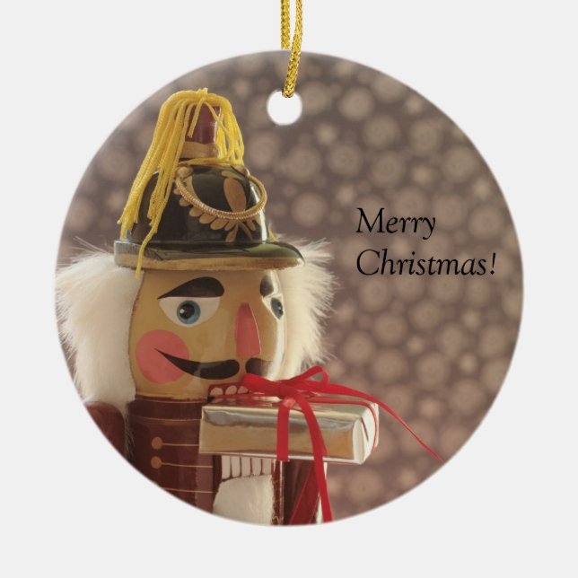 nutcracker with silver gift ornament (Front)
