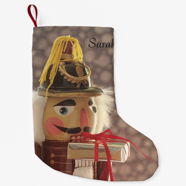 Nutcracker with silver gift small christmas stocking (Front)