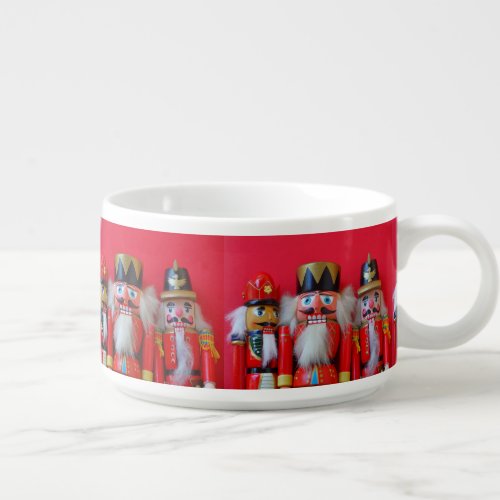 Nutcrackers in red uniforms bowl