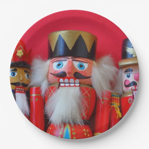 Nutcrackers in red uniforms paper plates