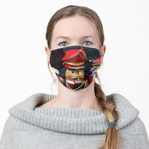 Nutcrackers on dark background adult cloth face mask