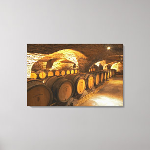 Oak barrles in the cellar at Domaine Comte Canvas Print
