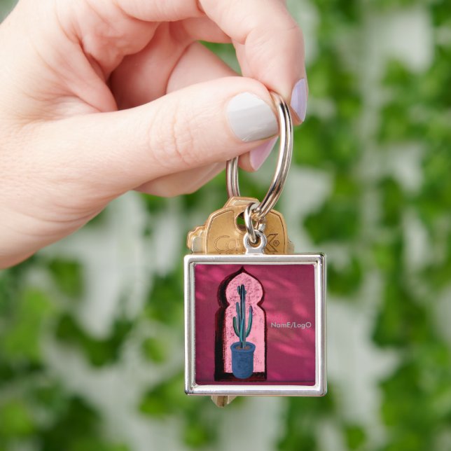 objet_21_a window with a cactus keychain (Hand)