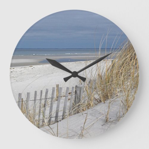 Ocean beach and sand fence large clock