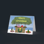 Ocean Beach Tropical Tiki Hut Drinks Christmas Fun Holiday Card<br><div class="desc">This tropical theme has it all - blender drinks, champange and beer on a tray, a santa hat, a holiday wreath with a star, and the beachy tiki hut bar in the sand with the ocean in the background. Merry Christmas is written on the tiki bar roof. A fun island...</div>
