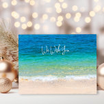 Ocean Beach Wish You Merry Christmas Holiday Postcard<br><div class="desc">Christmas postcards with ocean and beach scene.  Customize with your greeting and signature.  Tropical blue water and beach sand on the front with sample text,  "we wish you" (change wording to "I" as needed).  The wording continues onto the back with a "Merry Christmas" and "Happy New Year" greeting.</div>