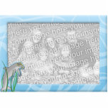 Ocean Fun Dolphin Picture Frame Cutout<br><div class="desc">Looking for a cool dolphin gift? Buy this cartoon dolphin picture frame! The magnetic photo frame is perfect for your refrigerator. The aquatic mammal has on a yellow diver's mask and a snorkel as he swims around the ocean, surrounded by sea grass. Instantly customize this product with your own photo!...</div>