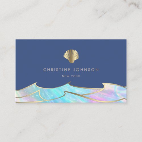 ocean waves and seashell logo on blue business card