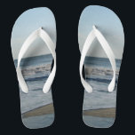 Ocean Waves Blue Sky Beach Sand Flip Flops<br><div class="desc">Pretty Blue Sky with Light Fluffy White Clouds, Blue Sea, Crashing Ocean Waves and Beach Sand Unisex Flip Flops. Shown with Wide White Straps and White Footbed. See options for flip flops in Slim Straps for more strap colors. Perfect for your summertime fun, trips to the beach, vacations, honeymoon or...</div>