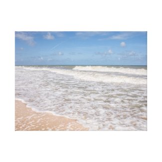 Ocean Waves Covering The Sand On The Beach