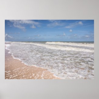 Ocean Waves Covering The Sand On The Beach