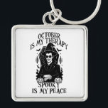 October Is My Therapy, Spooky Is My Peace Keychain<br><div class="desc">A bold gothic-style artwork featuring a mysterious witch in sunglasses,  framed by pumpkins,  bats,  and candlelight. This monochrome design captures the magic and mystery of October,  perfect for those who find peace in spooky season vibes.</div>