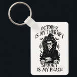October Is My Therapy, Spooky Is My Peace Keychain<br><div class="desc">A bold gothic-style artwork featuring a mysterious witch in sunglasses,  framed by pumpkins,  bats,  and candlelight. This monochrome design captures the magic and mystery of October,  perfect for those who find peace in spooky season vibes.</div>