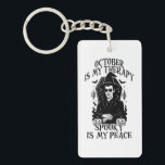 October Is My Therapy, Spooky Is My Peace Keychain<br><div class="desc">A bold gothic-style artwork featuring a mysterious witch in sunglasses,  framed by pumpkins,  bats,  and candlelight. This monochrome design captures the magic and mystery of October,  perfect for those who find peace in spooky season vibes.</div>
