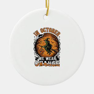 October We Wear Orange Flying Witch Pumpkins Black Ceramic Ornament
