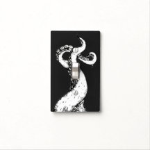 octopus tentacles on black light switch cover