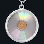 Offbeat & Quirky CD Necklace<br><div class="desc">Offbeat & Quirky CD Necklace 
 CD,  quirky,  offbeat,  disc,  discs,  "compact disc",  "compact discs",  music,  player,  players,  radio,  recording,  recordings,  playing,  sound,  sounds,  audio,  hear,  hearing,  play,  silver,  rainbow,  circle,  circular, </div>