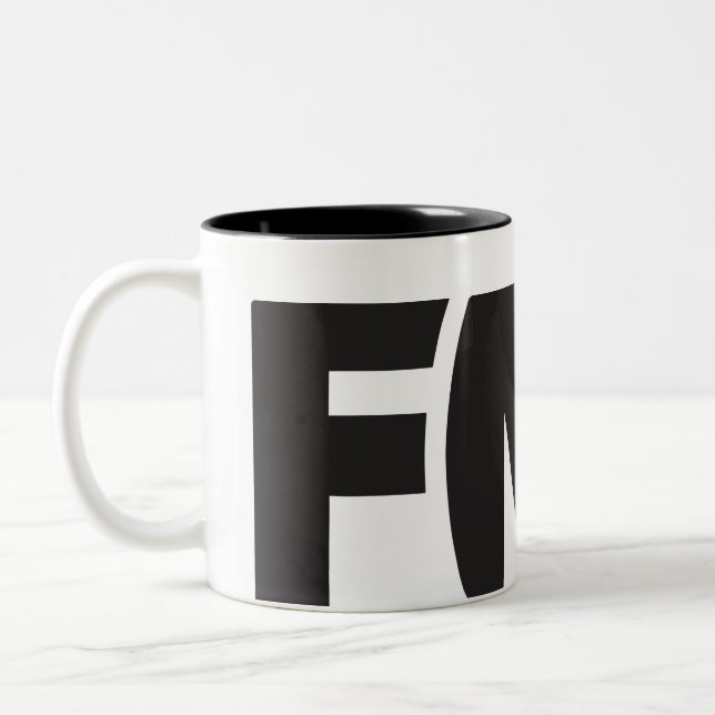 Official FML Mug: FML Logo (Black) Two-Tone Coffee Mug (Left)