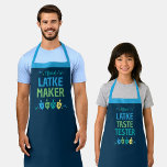 Official Latke Maker Hanukkah Apron<br><div class="desc">Share the joy of the holiday season with your friends and family with this Official Latke Maker Hanukkah Apron. This design features colorful dreidels on a navy background surrounded by confetti. Pair with other items from the Hanukkah Dreidel Party collection for a cohesive, festive celebration.</div>