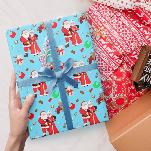 Oh Baby Santa & Mrs. Claus Baby Shower Blue Wrapping Paper (
Embrace holiday magic with Santa & Mrs. Claus Baby Shower Wrapping Paper. )