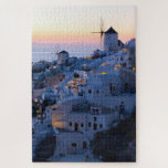 Oia Santorini Greece Sunset Jigsaw Puzzle<br><div class="desc">This design features a sunset over the coastal town of Oia, on the tip of Santorini a Greek Aegean island. The town has whitewashed houses carved into the rugged clifftops, and overlooks a vast caldera filled with water. #oia #santorini #greece #greek #sunset #village #town #whitewashed #travel #destination #adventure #photo #photograph...</div>