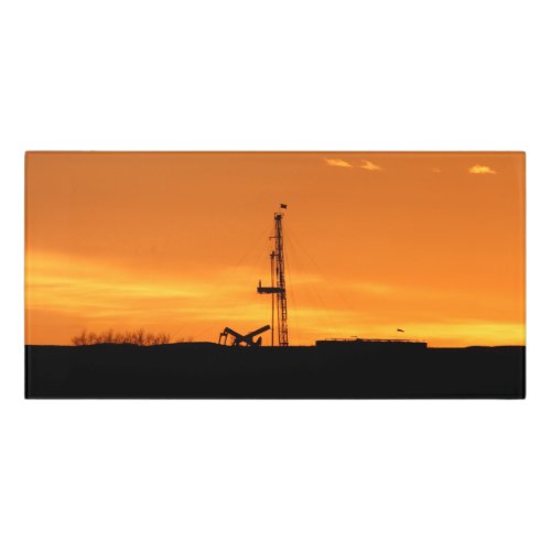 Oilfield Workover Service Rig at Sunset Door Sign