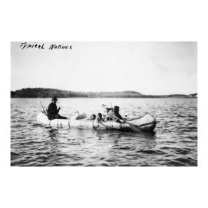 Ojibwa Indians crossing lake in Canoe Photograph Poster
