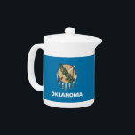 Oklahoma State Flag Teapot<br><div class="desc">Infuse your tea time with a touch of Oklahoma pride using our exclusive teapot featuring the flag of Oklahoma! This teapot is more than just a functional kitchen accessory; it’s a stylish tribute to Oklahoma’s unique heritage and cultural pride. Adorned with the iconic Oklahoma state flag, this teapot adds a...</div>